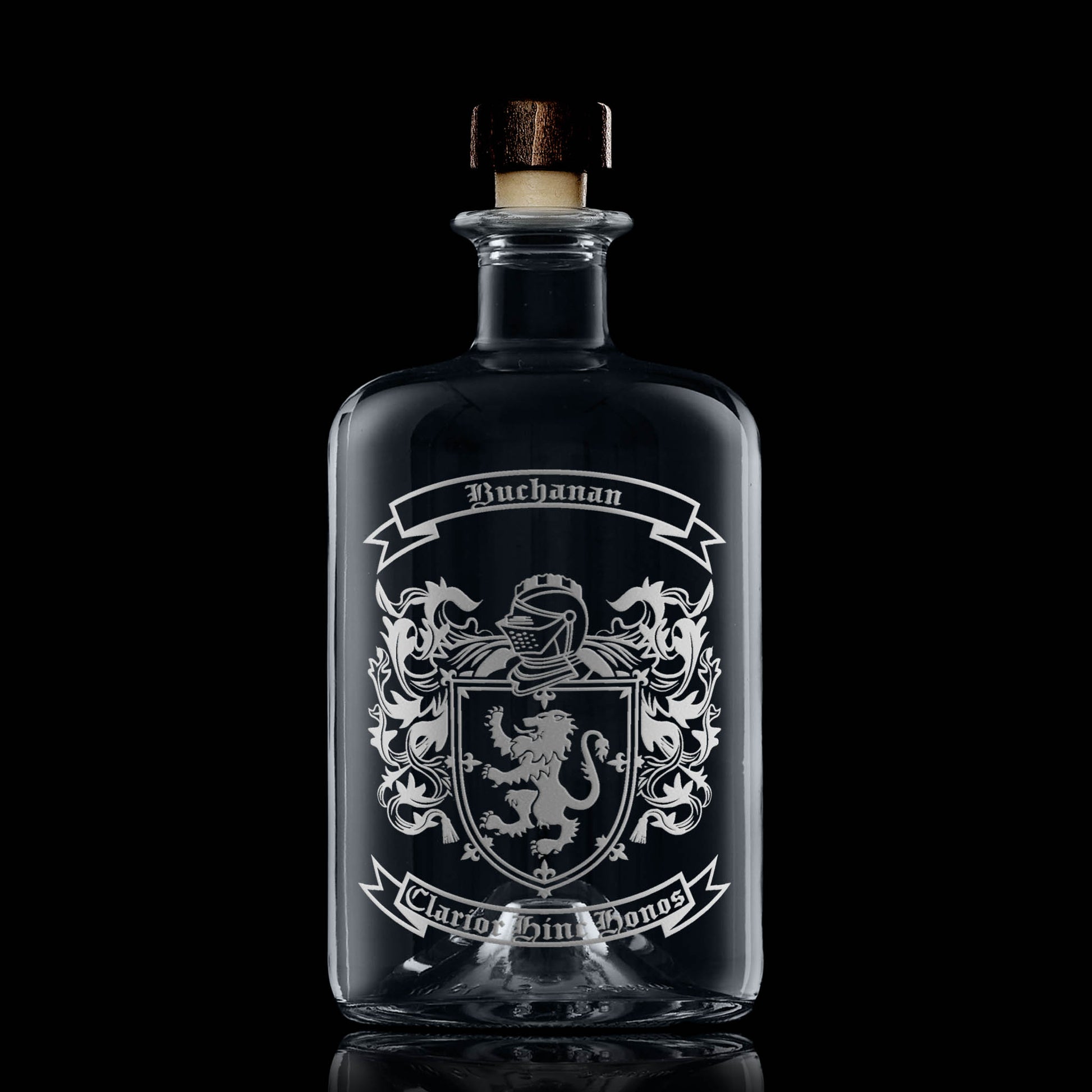 Apothecary decanter with Buchanan heraldic coat of arms — straight sides, ground-glass stopper, permanent engraving.