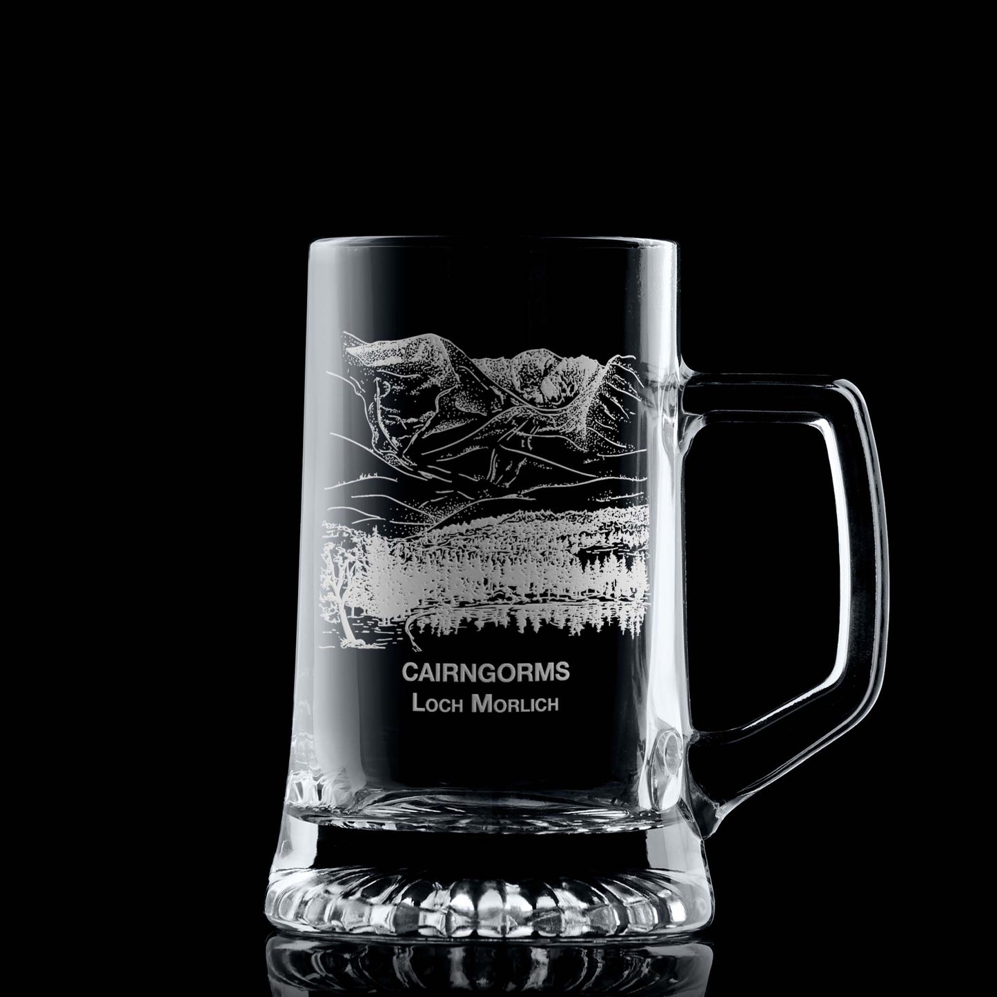 Engraved tankard with Cairngorms and Loch Morlich design shown on black background, handle on right of engraving