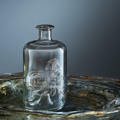 etched apothecary bottle engraved with viking horse or kelpie