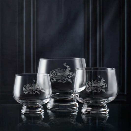 Three presentation bowls engraved with a celtic knotwork deer and abstract patterns