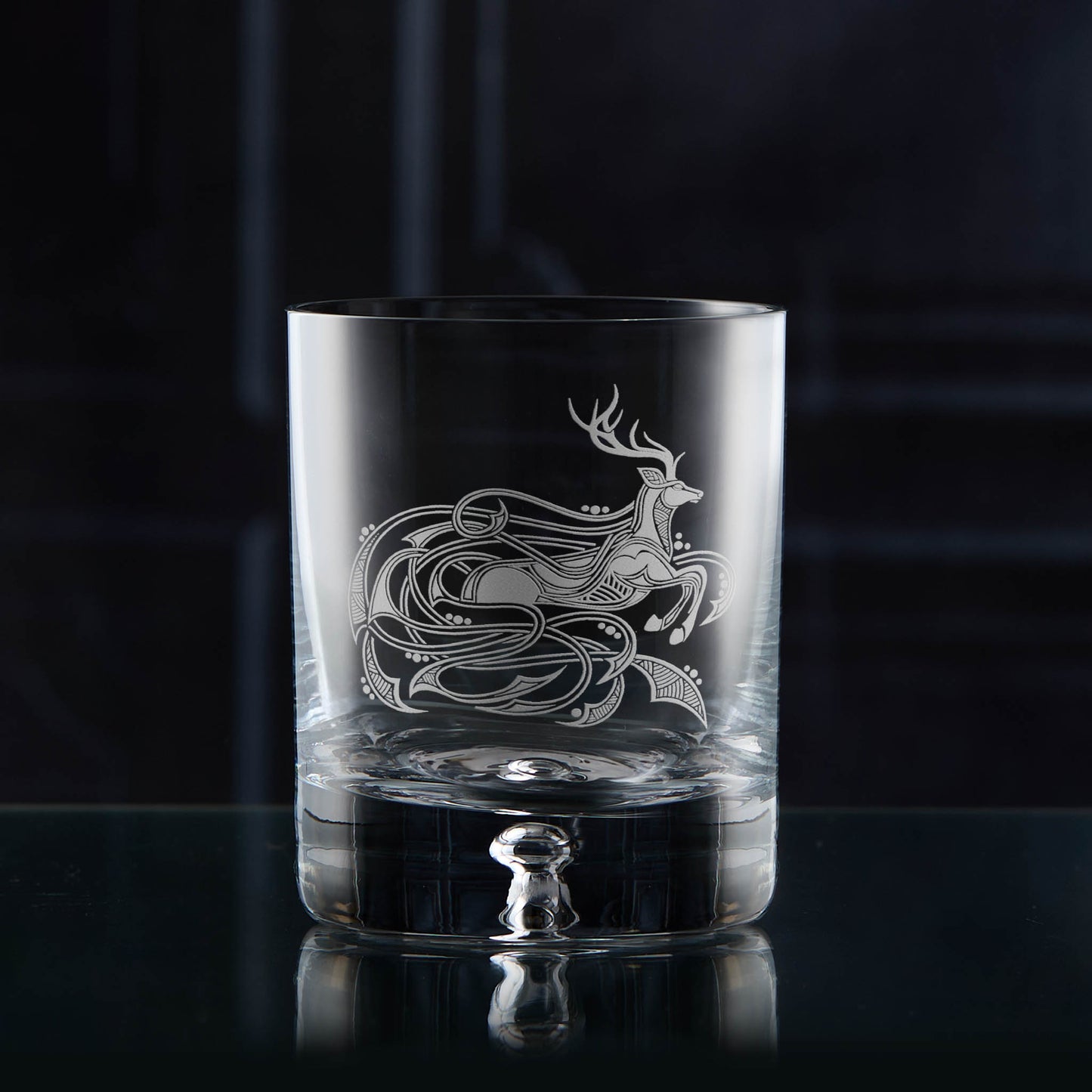 Sandblast engraved whisky glass featuring a scottish stag