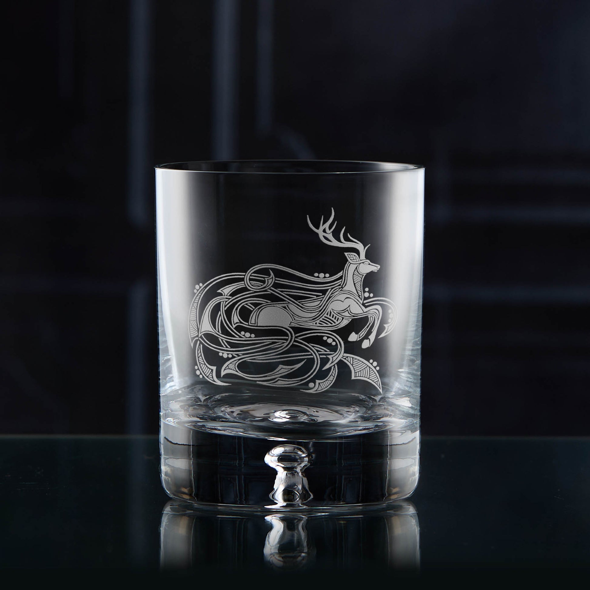 Sandblast engraved whisky glass featuring a scottish stag