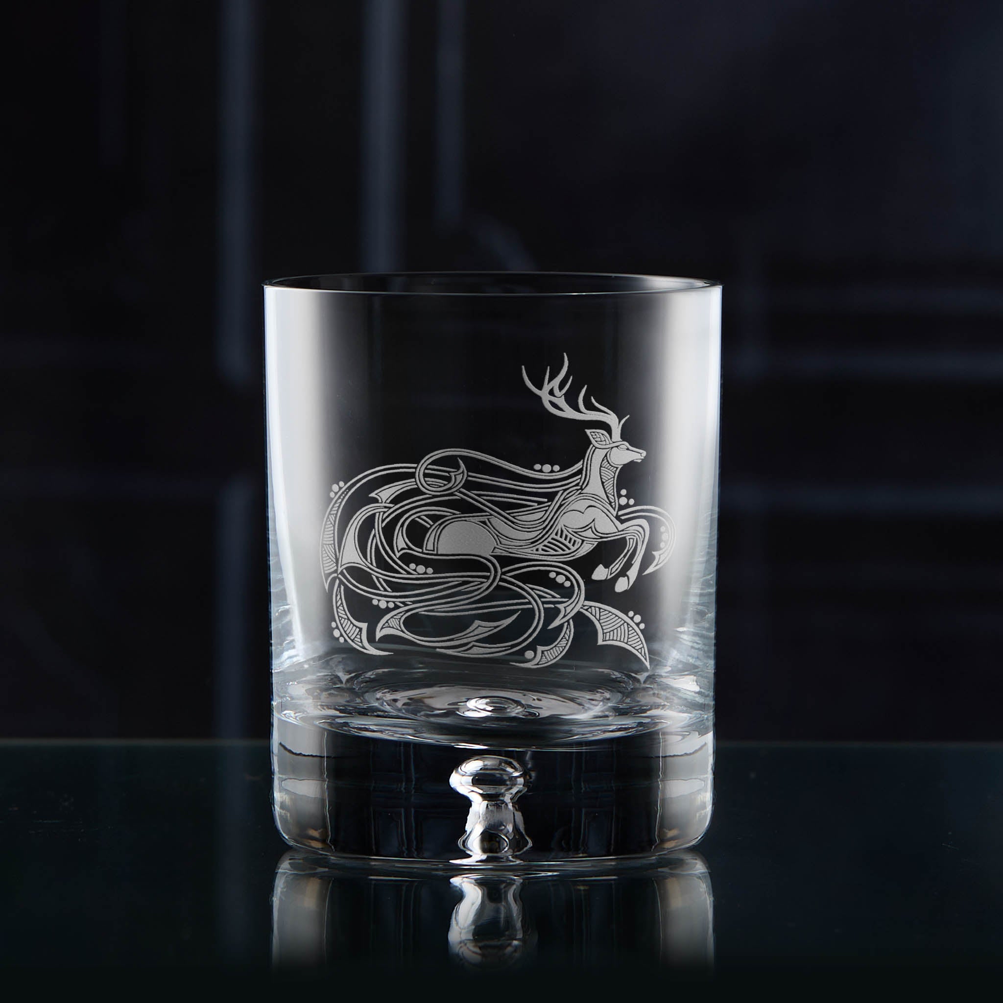 Sandblast engraved whisky glass featuring a scottish stag