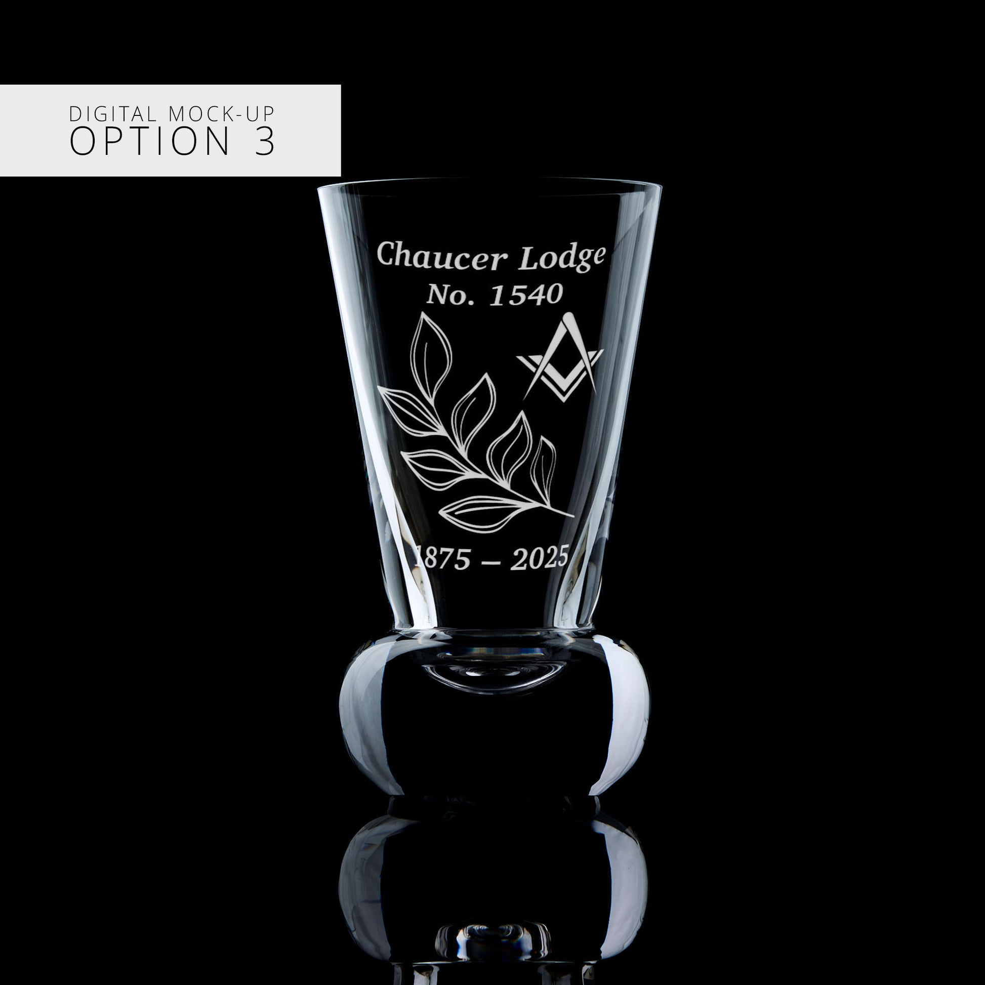 Glass with engraved design and text on a black background