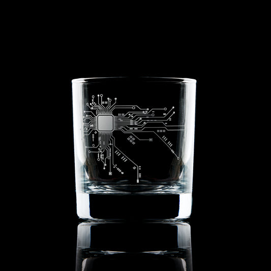 whiskey glass engraved with a circuit board