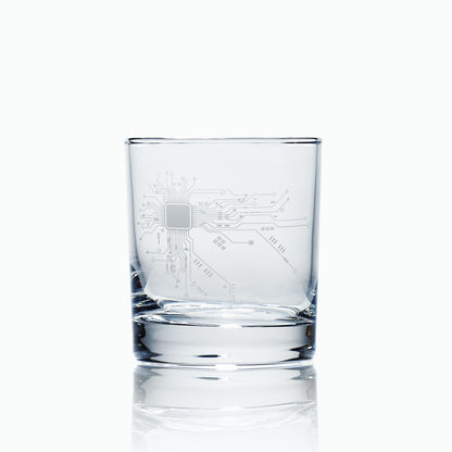 whiskey glass engraved with a circuit board