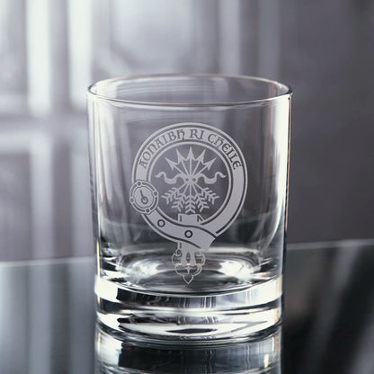 whisky tumbler engraved with the Cameron family clan crest surrounded by a scottish belt and buckle