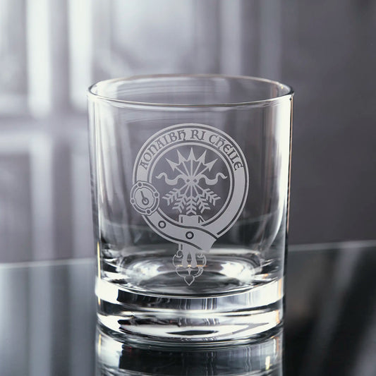 whisky tumbler engraved with the Cameron family clan crest surrounded by a scottish belt and buckle