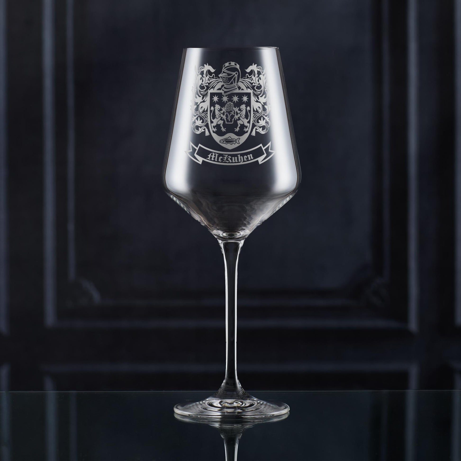 heraldic coat of arms on wine glass — crisp, permanent engraving.