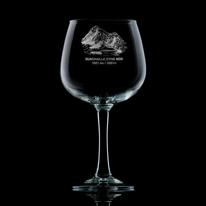 Stemmed gin glass engraved with Coire na Tulaich on Buachaille Etive Mòr, photographed on a black background
