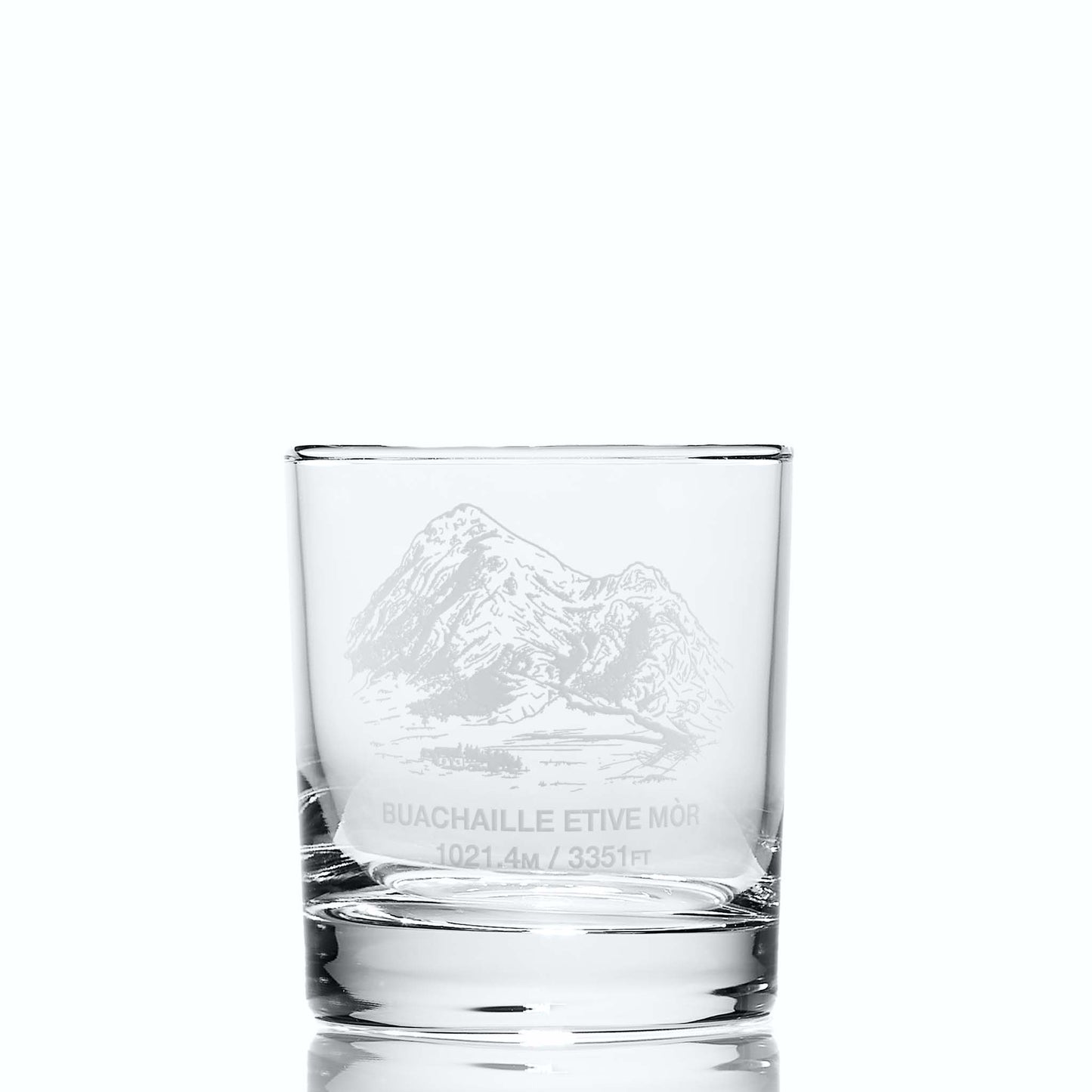 Whisky glass engraved with Coire na Tulaich on Buachaille Etive Mòr, photographed on a white background”