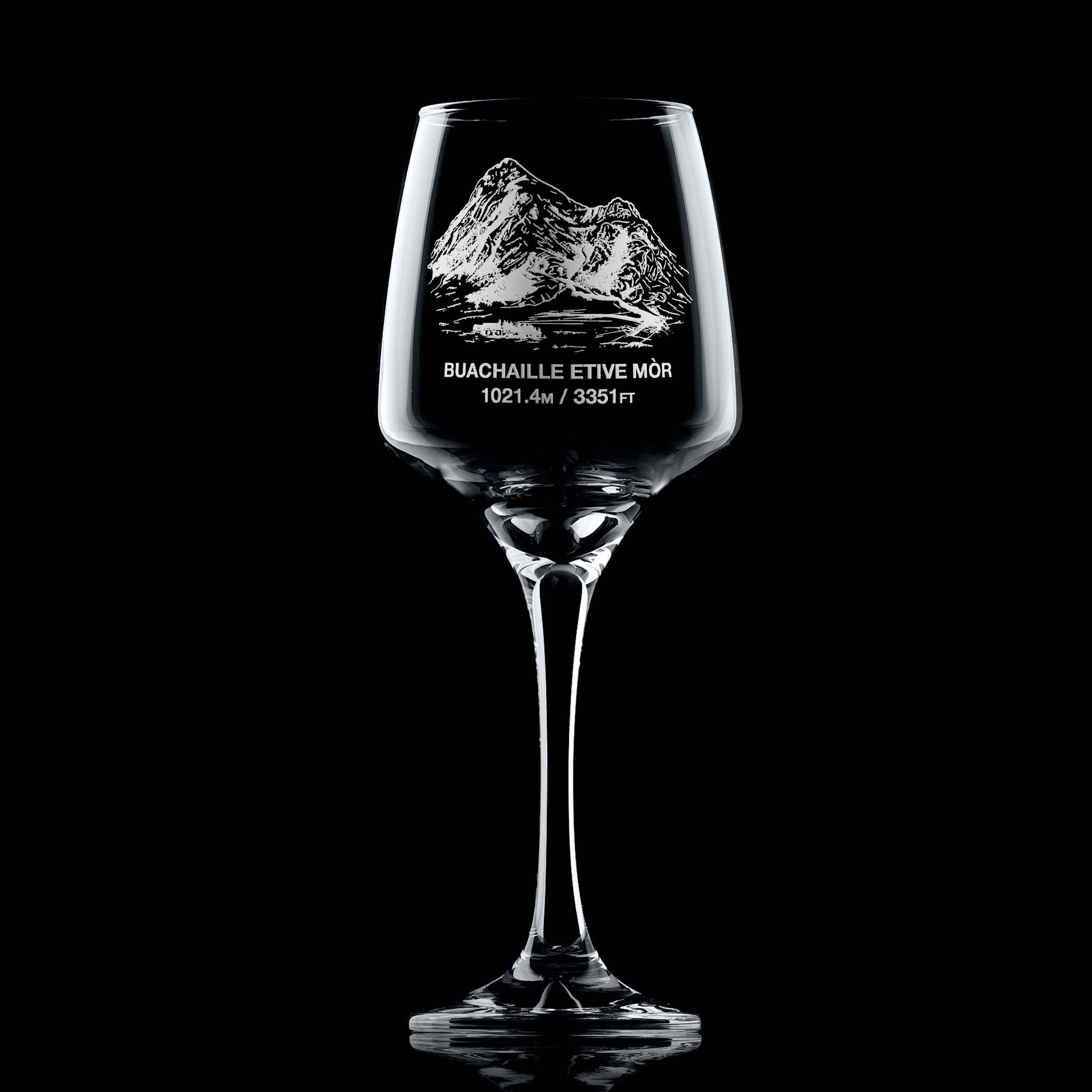 Wine glass engraved with Coire na Tulaich on Buachaille Etive Mòr, photographed on a black background