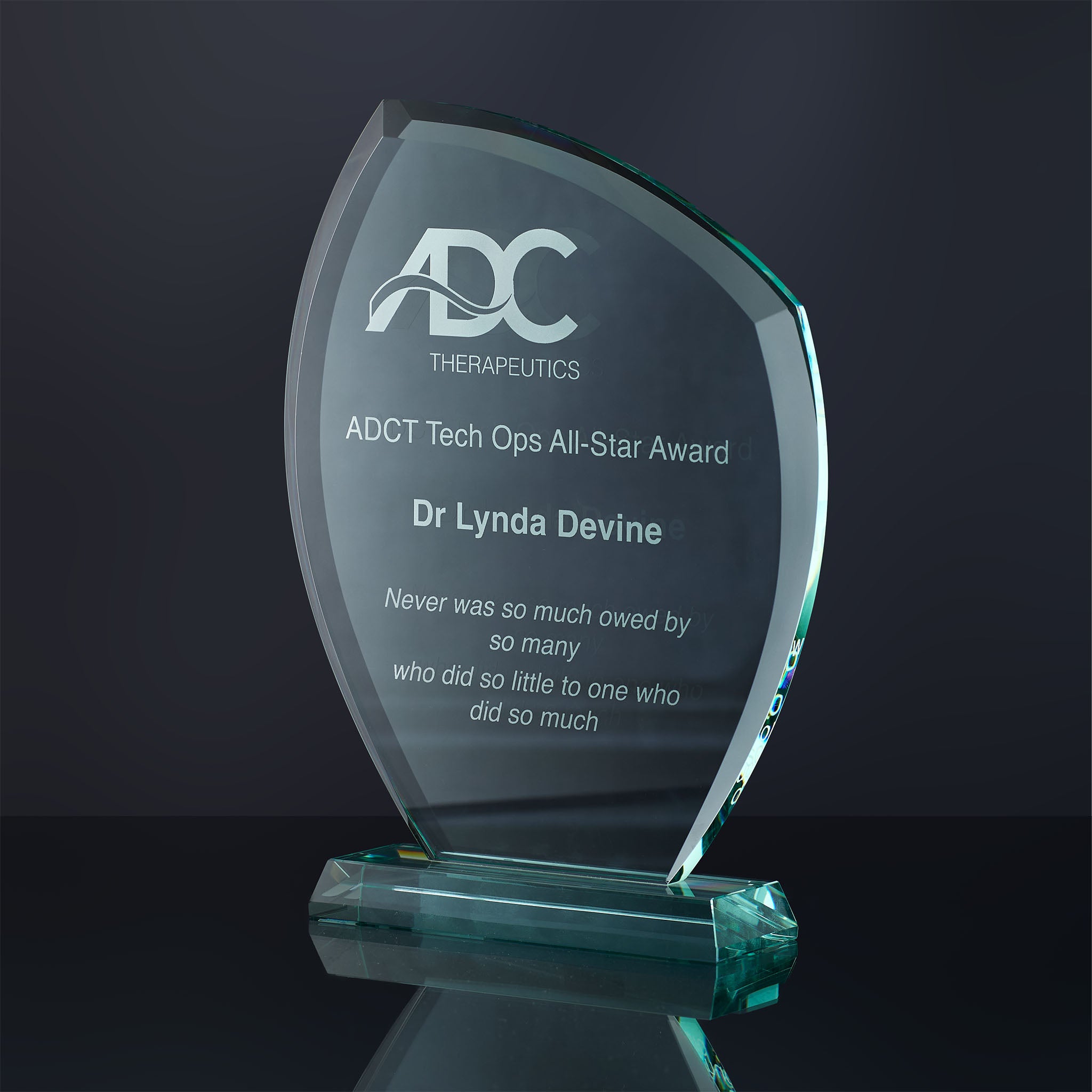 Custom award engraved with personalised text for a corporate event