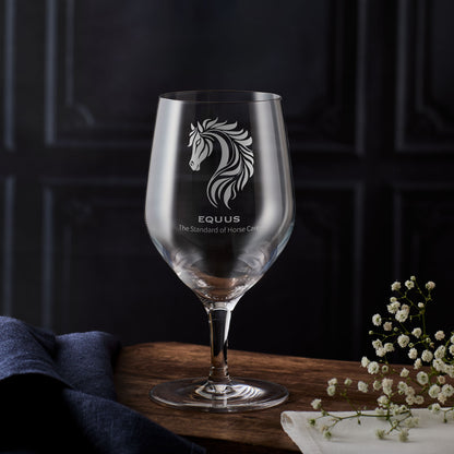 Mineral water glass with  a business logo and corporate branding on a dark background