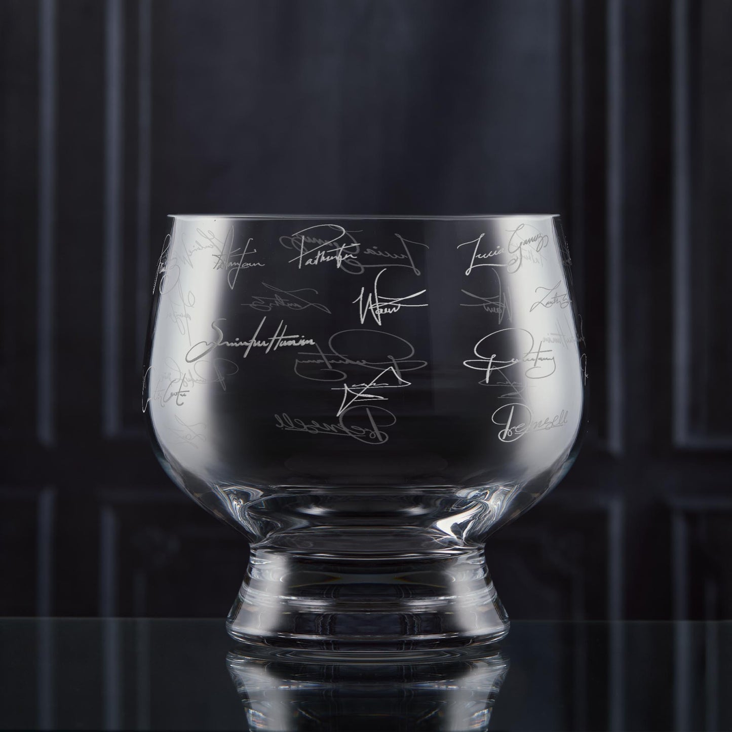 Hand-engraved presentation bowl with team signatures and space for company logo