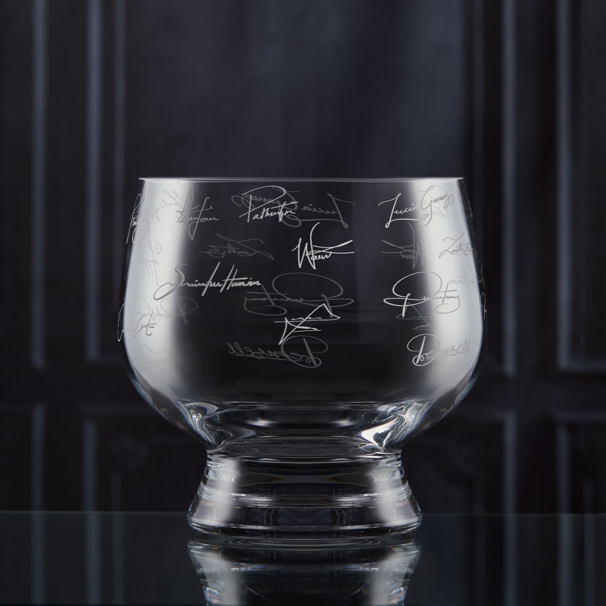 Hand-engraved presentation bowl with team signatures and space for company logo
