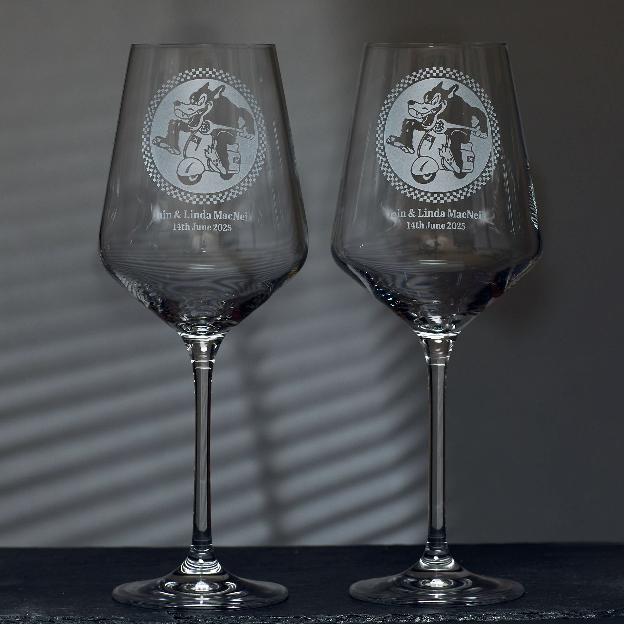 scooter club logo engraved wine glasses, personalised with two tone checks and text