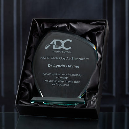 Large jade glass leaf award, customised with logo and text in a black satin lined presentation box