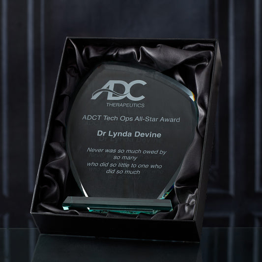 Large jade glass leaf award, customised with logo and text in a black satin lined presentation box