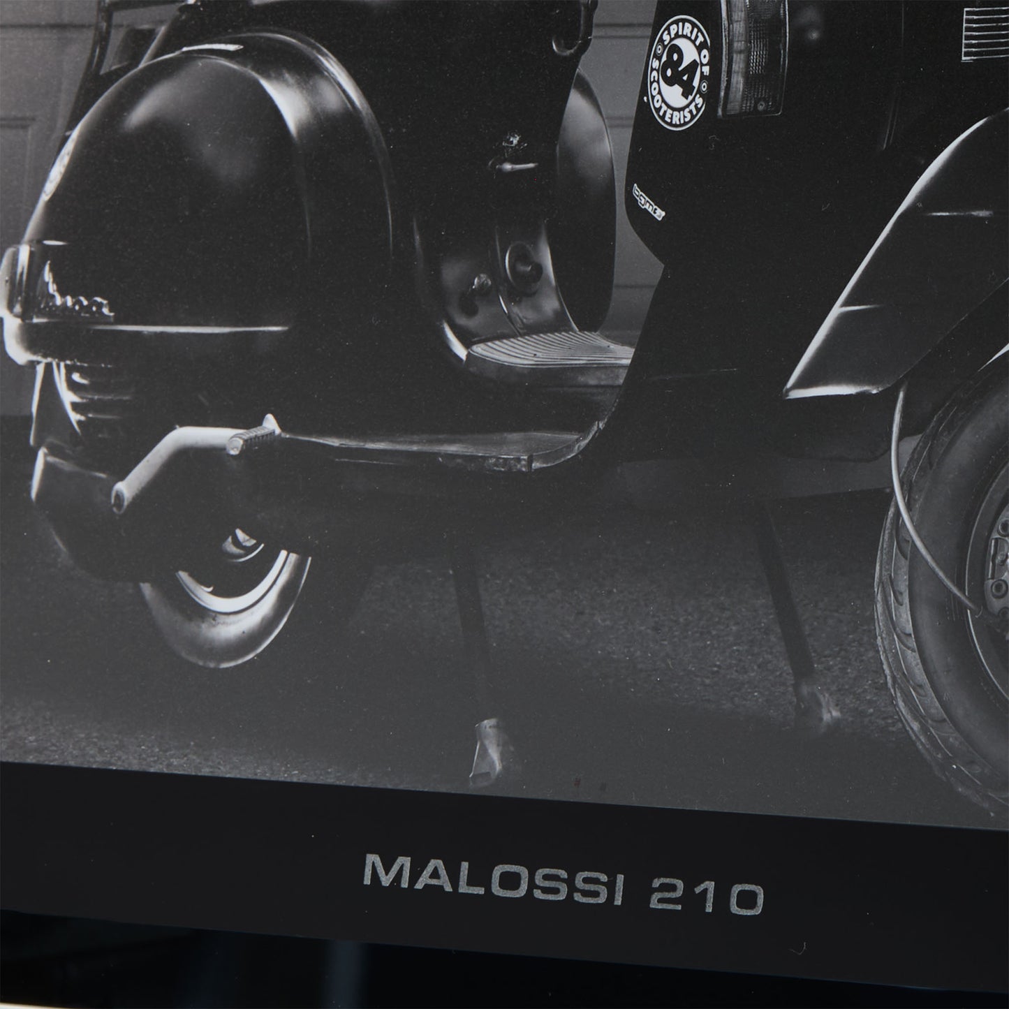 Personalised engraving detail of a customised black glass picture frame