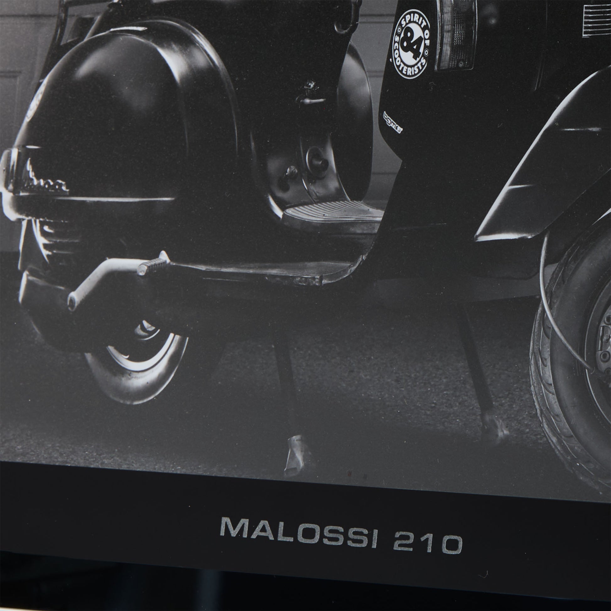 Personalised engraving detail of a customised black glass picture frame