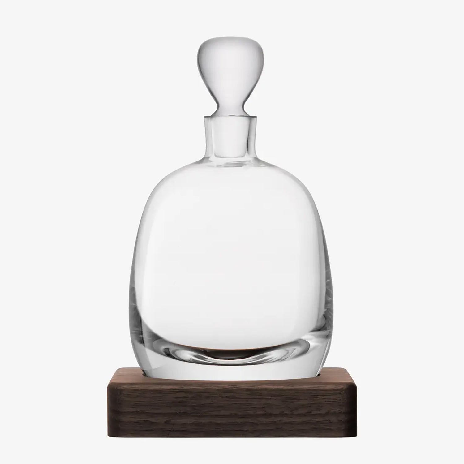 BLOG__Clear glass decanter with wooden base