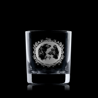 Whisky glass engraved with an illustration of an english spinger spaniel