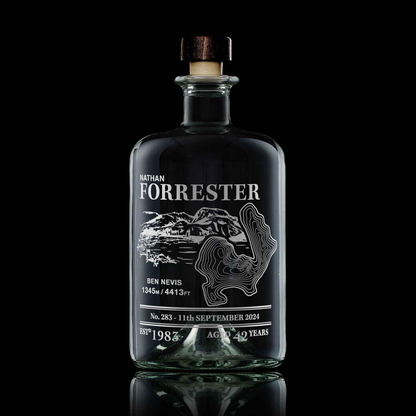 Apothecary-style decanter engraved with Ben Nevis, photographed on a black background