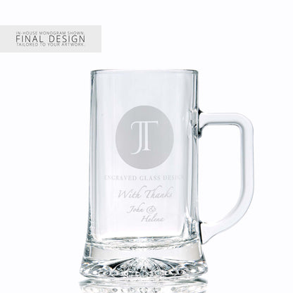 Glass tankard with a corporate logo and a personalised engraved message on a white background