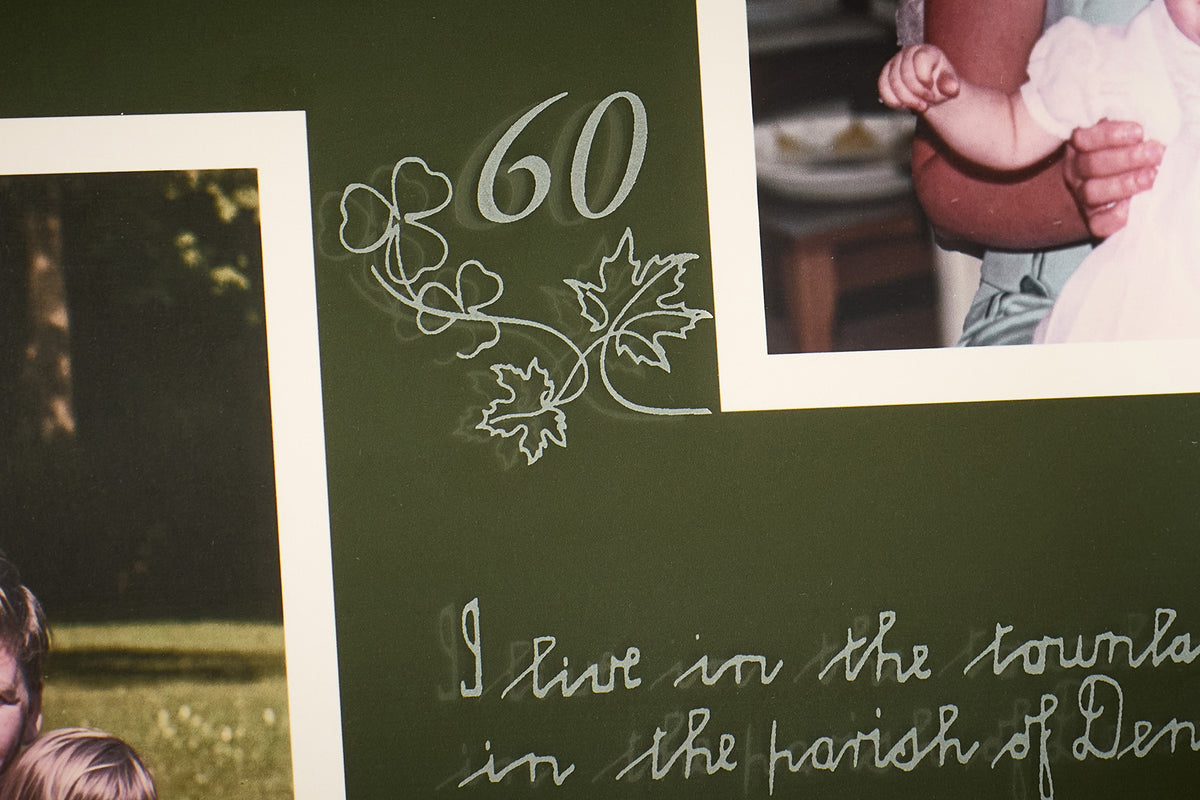 Close detail of original family handwriting reproduced as engraving on glass