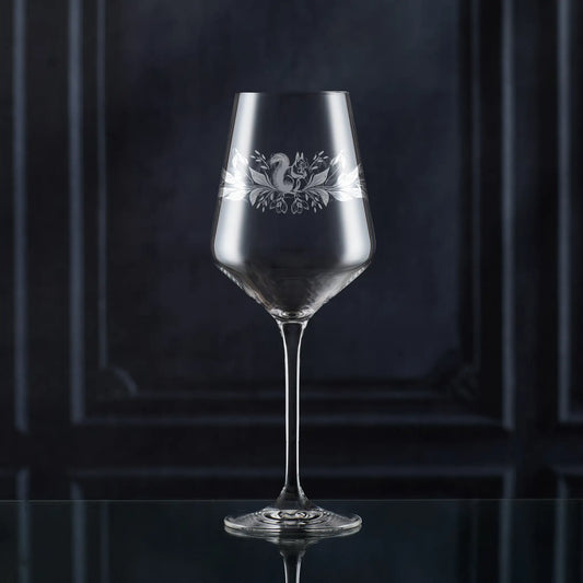 Atelier wine glass engraved with January birth flowers — snowdrops and red squirrel