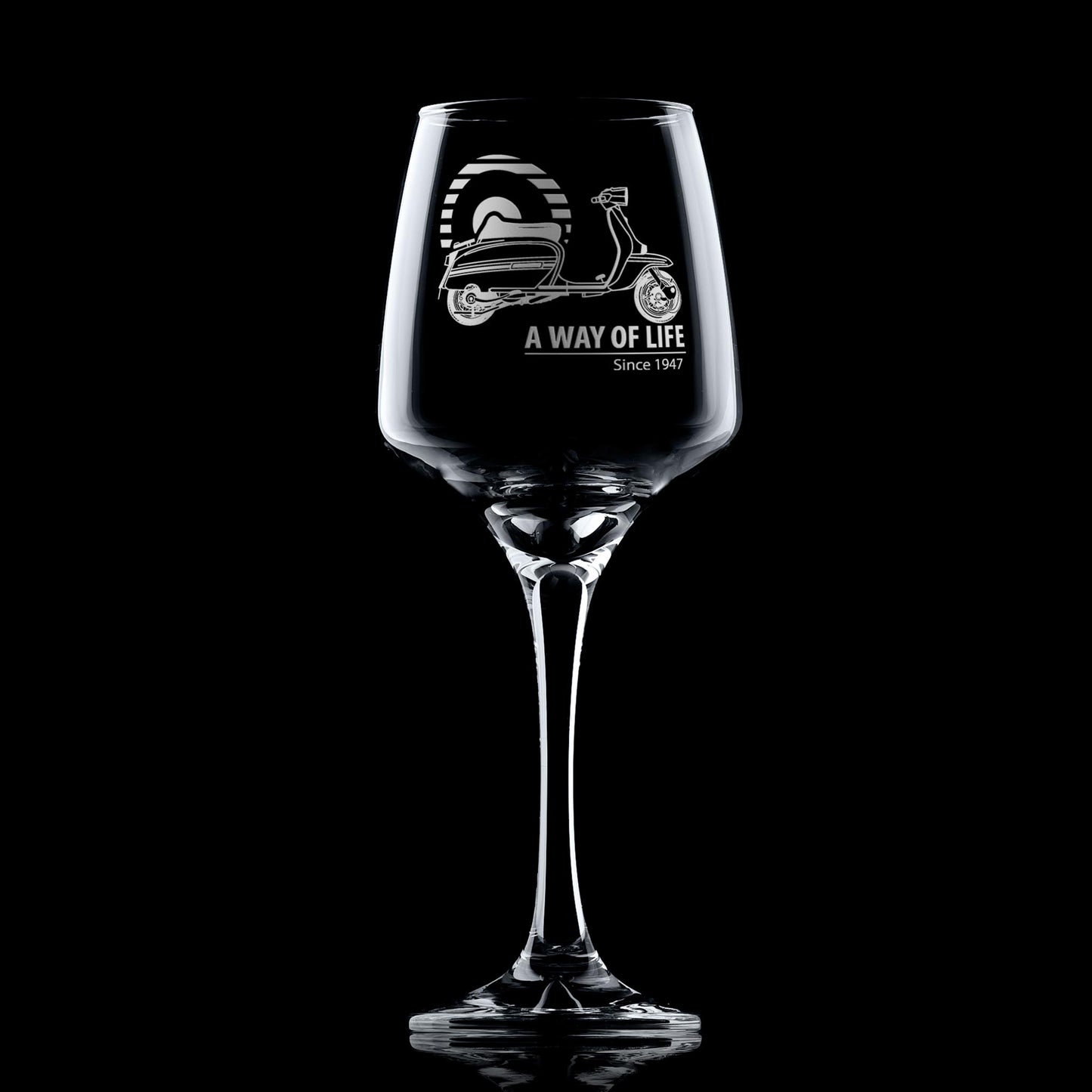 Engraved Lambretta GP wine glass with ‘A Way of Life Since 1947’ inscription, shown against dark background