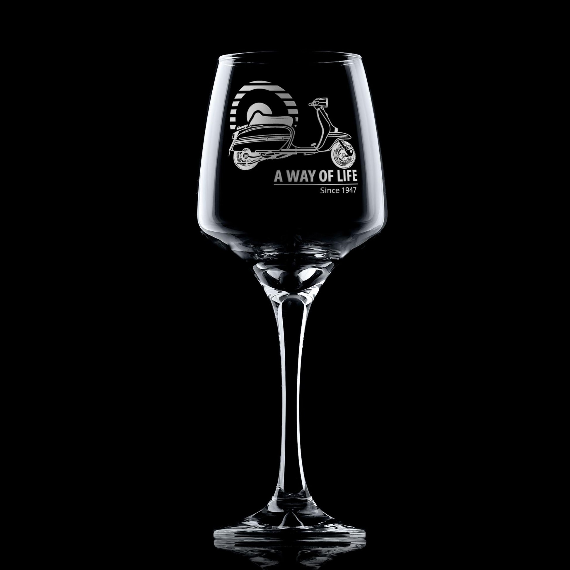 Engraved Lambretta GP wine glass with ‘A Way of Life Since 1947’ inscription, shown against dark background
