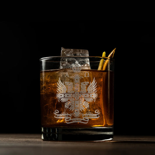 Engraved whisky glass with Red Cross of Constantine double-headed eagle on black background
