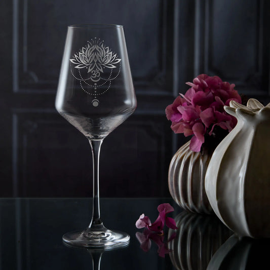 Wine glass engraved with lotus flower, om and moon symbols