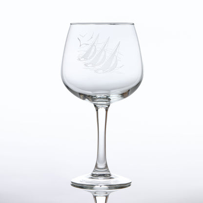 Balloon Gin glass engraved with sailing boats and seabirds.