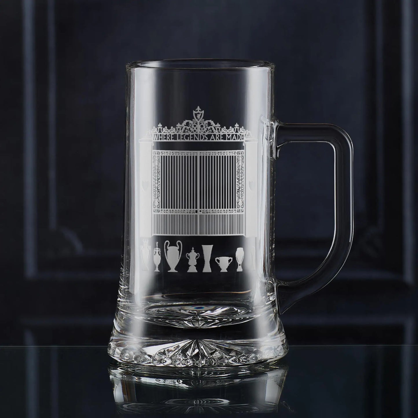 Glass tankard engraved with Shankly Gates line-art and football trophy silhouettes, inspired by the architecture around Anfield.