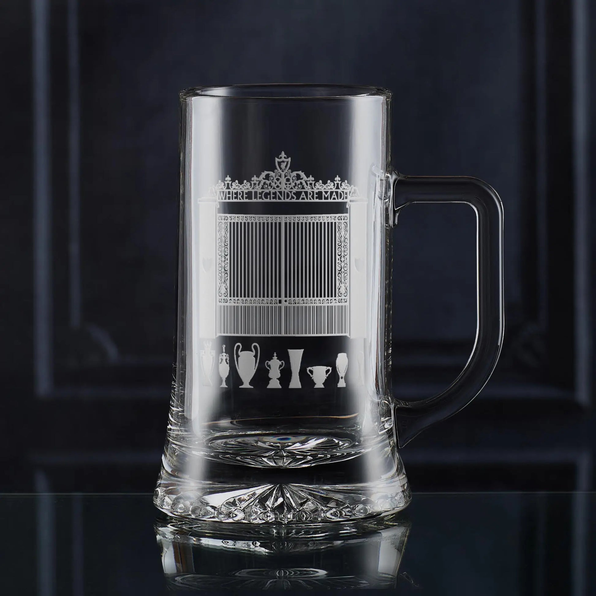 Glass tankard engraved with Shankly Gates line-art and football trophy silhouettes, inspired by the architecture around Anfield.