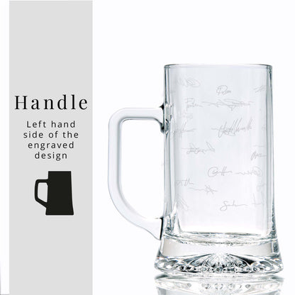 Glass beer tankard with engraved collegues handwritten signatures on a white background