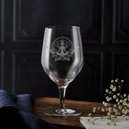 Stemmed mineral water glass engraved with Lotus Mandala Design and female Suhasana pose