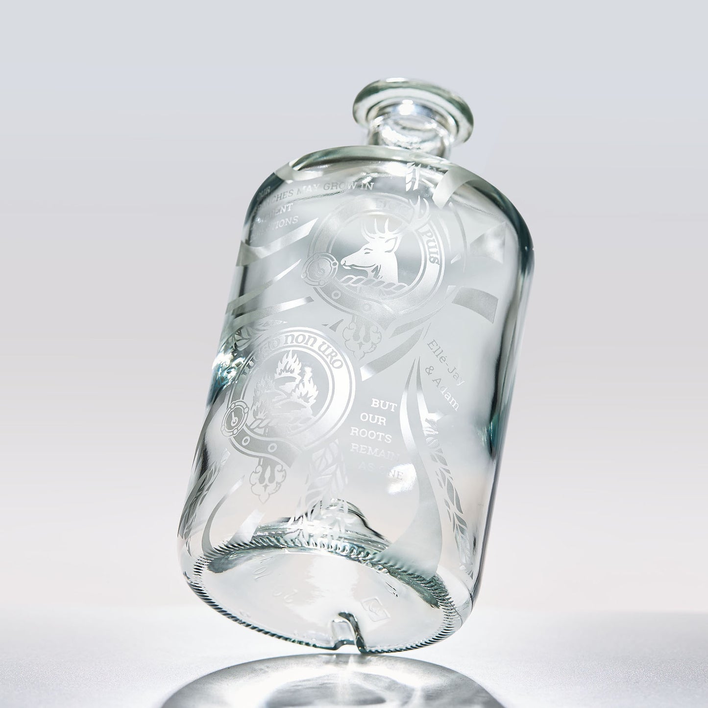 decanter engraved with family clan crests