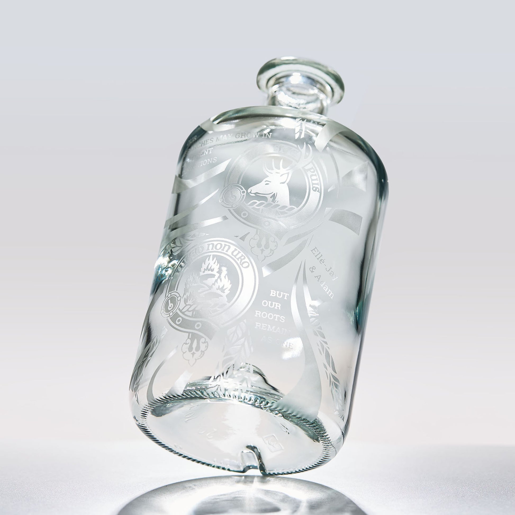 decanter engraved with family clan crests