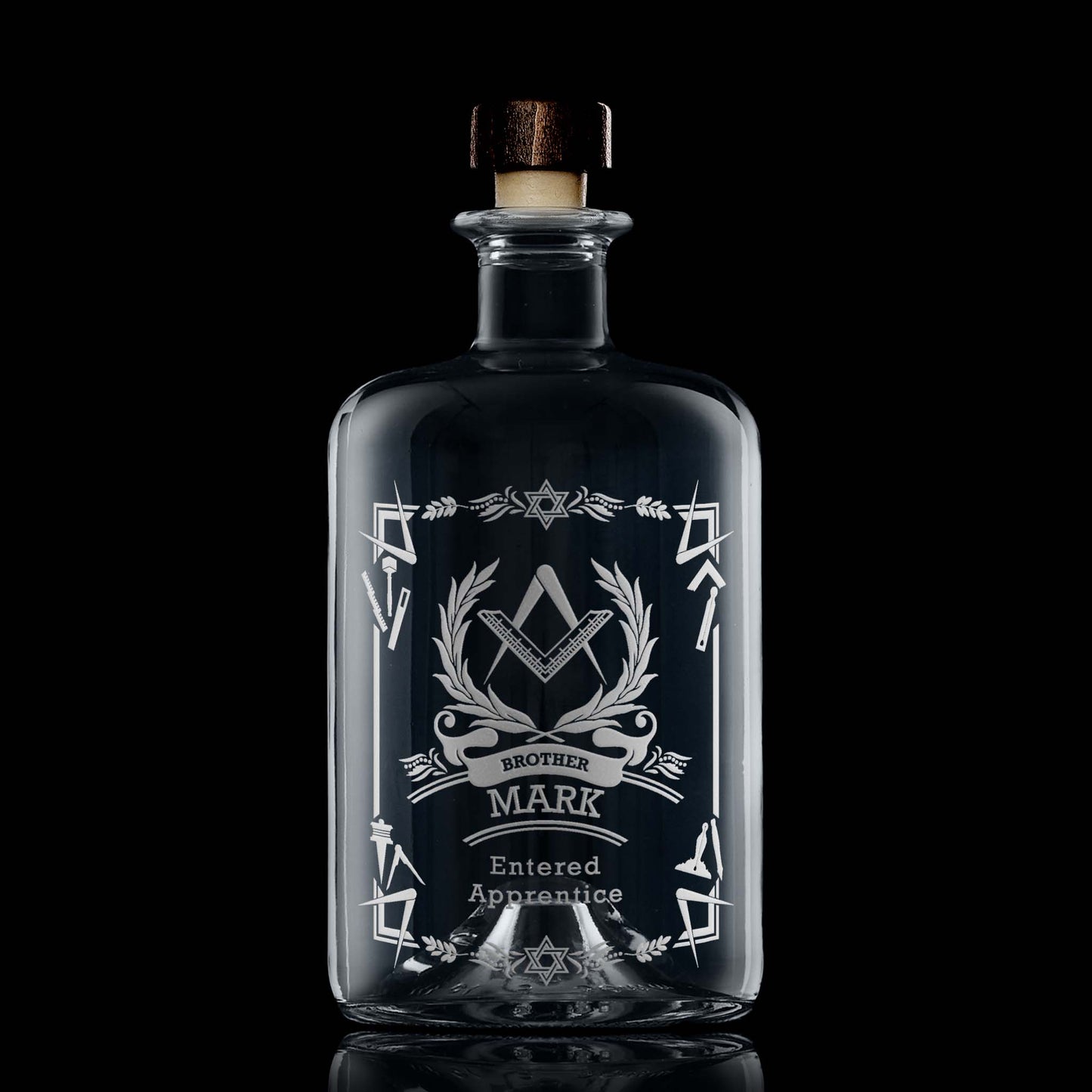 Apothecary style masonic decanter engraved with a 1st Degree Entered Apprentice Square & Compass on black background