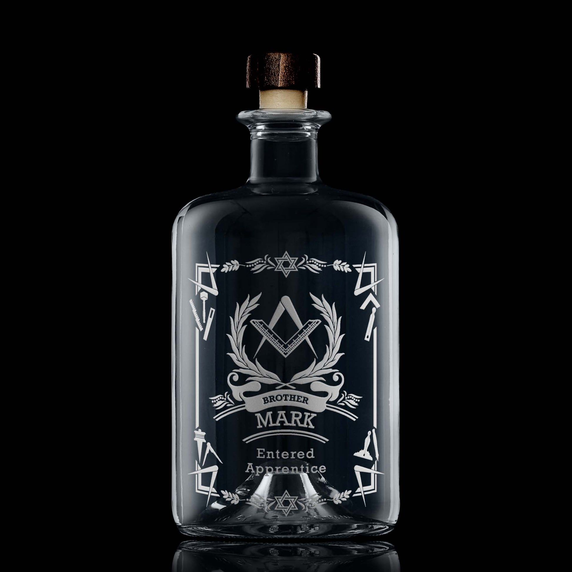 Apothecary style masonic decanter engraved with a 1st Degree Entered Apprentice Square & Compass on black background