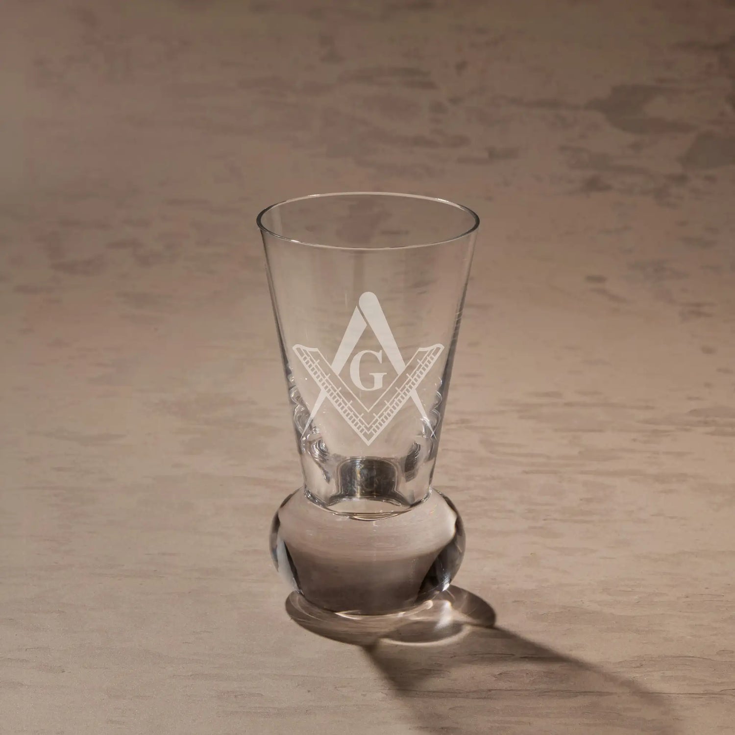 Entered Apprentice First Degree square and compass engraved on firing glass.