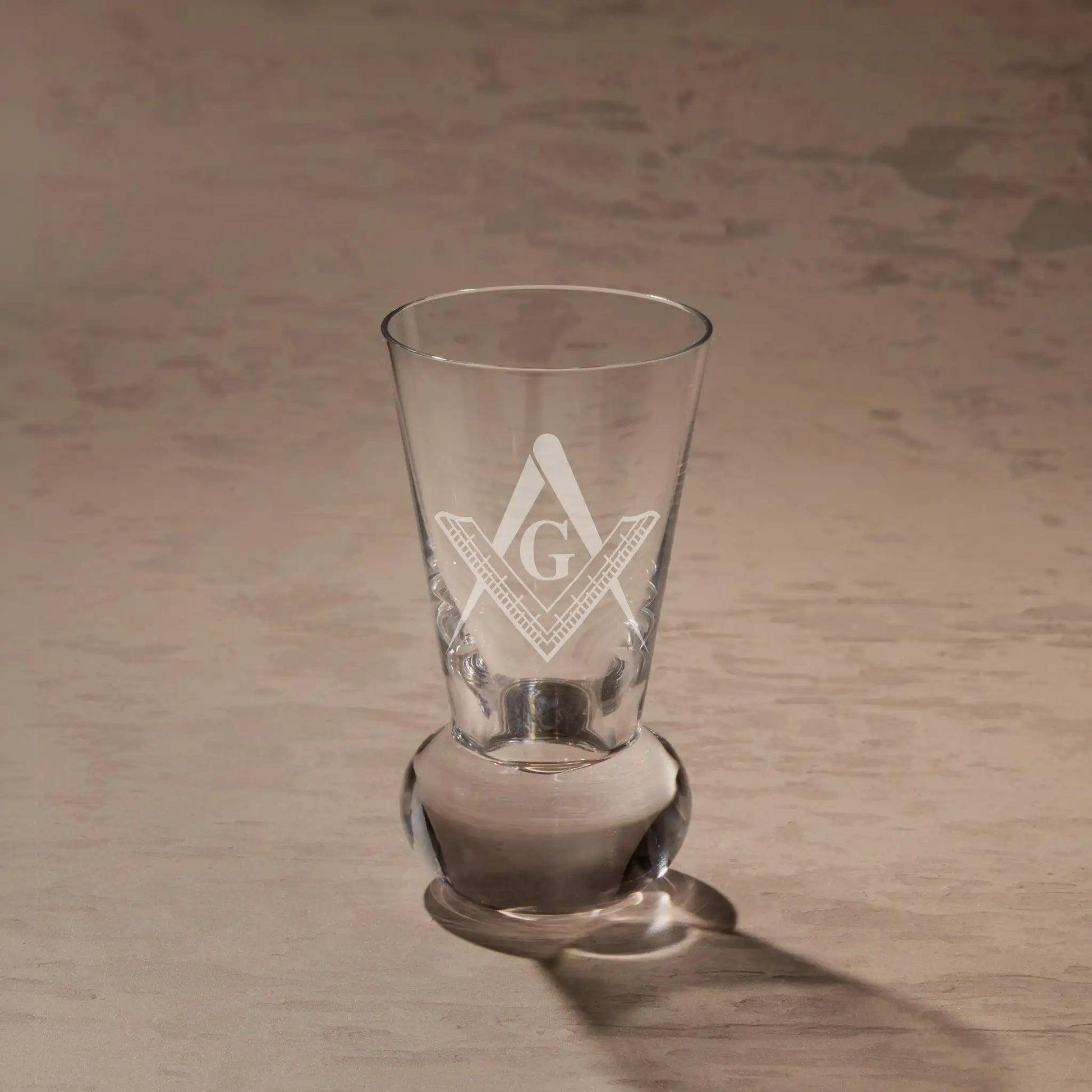 Entered Apprentice First Degree square and compass engraved on firing glass.