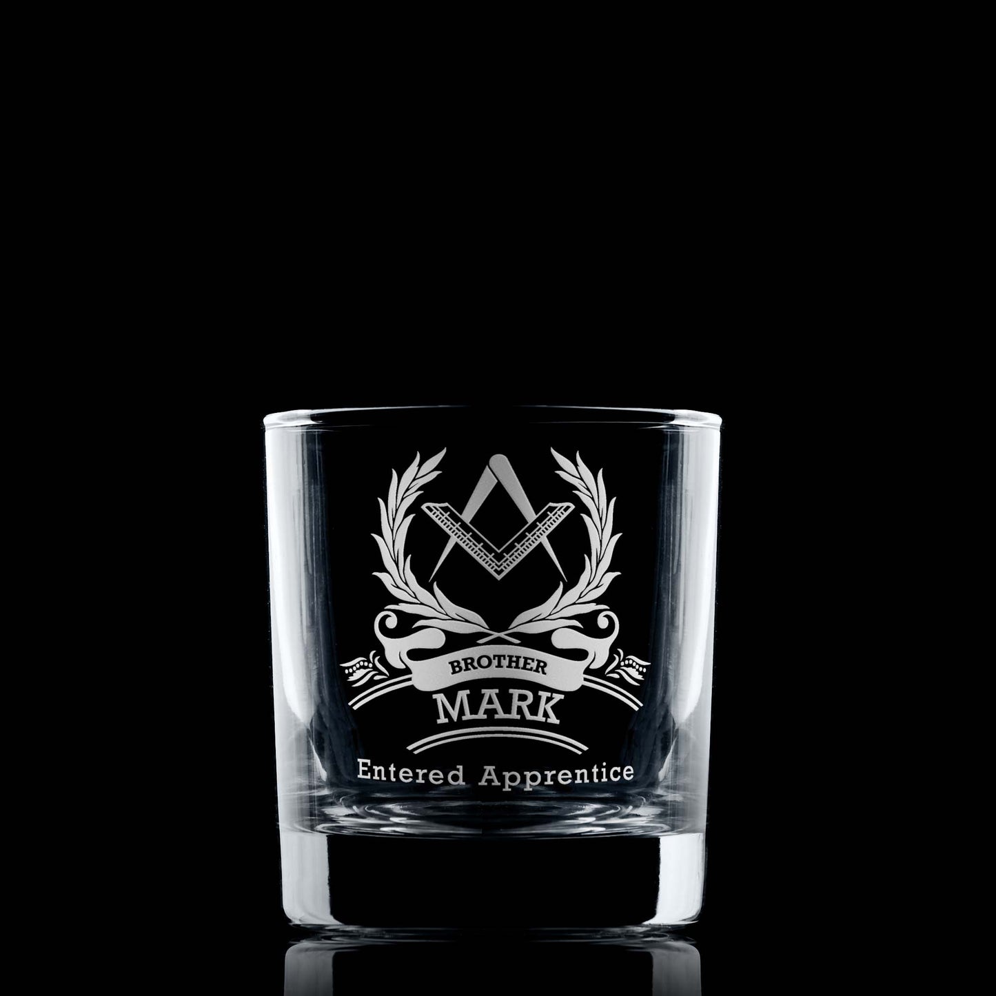 Masonic whisky glass engraved with a 1st Degree Entered Apprentice Square & Compass on black background