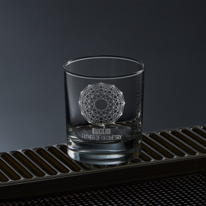 Euclid whisky glass engraved with mathematical design, shown on silver drip-tray to display shape and detail.