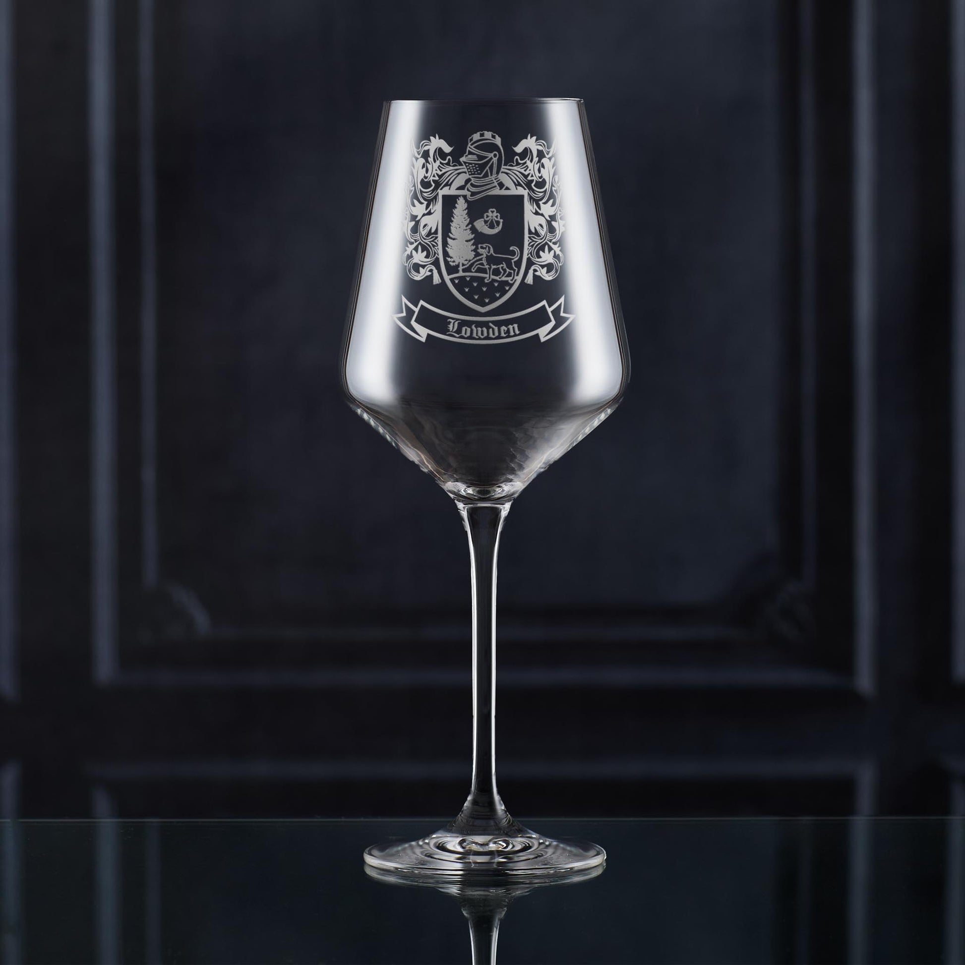 Fine stem wine glass with engraved family coat of arms and surname — traditional sandblasting.