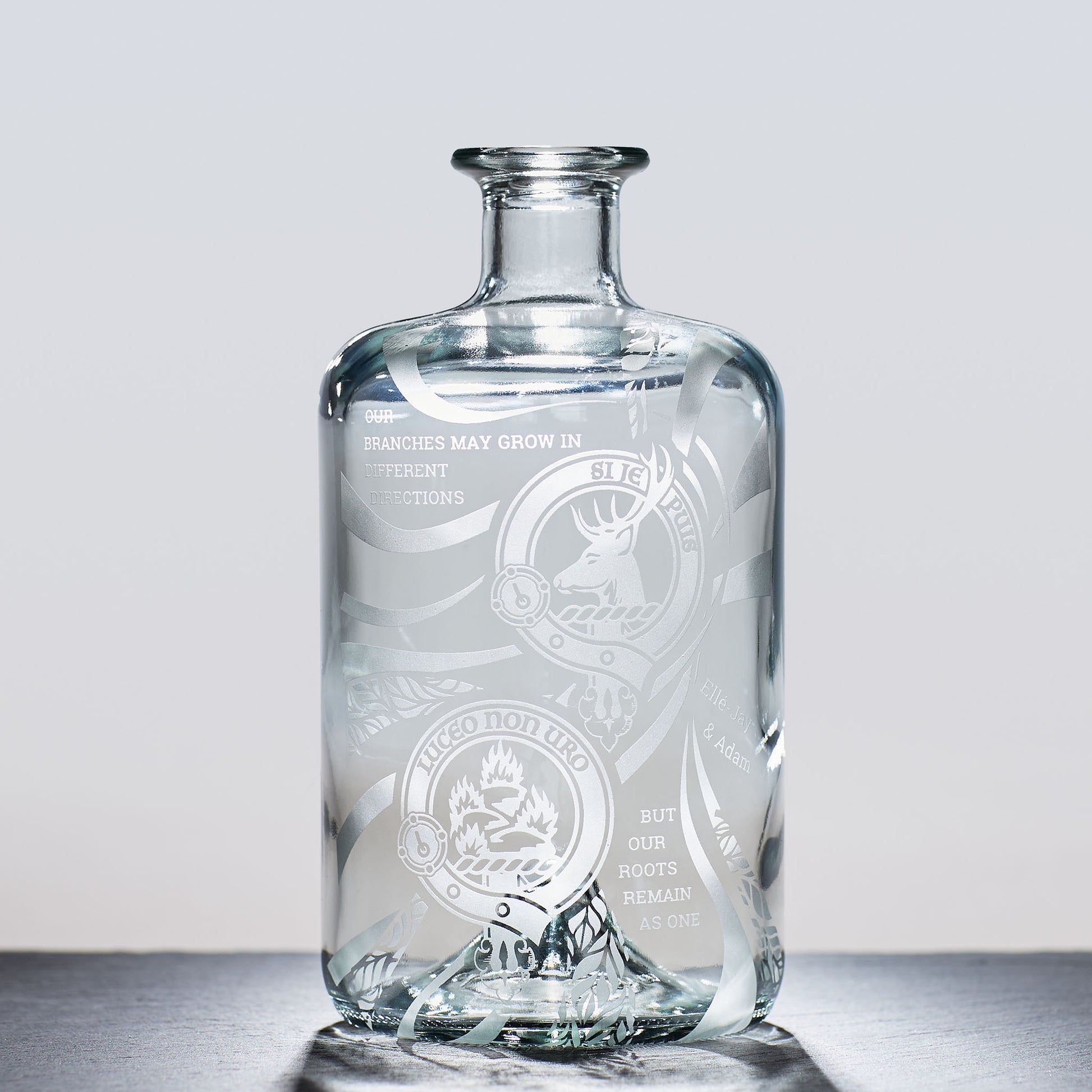 decanter engraved with family clan crests